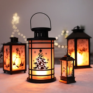 Christmas LED decorative lanterns with simulated flame and holiday silhouette patterns