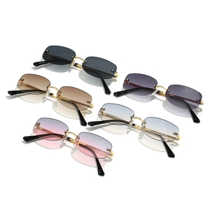 Y2K rimless rectangular sunglasses in multiple gradient lens colors with golden metal frames