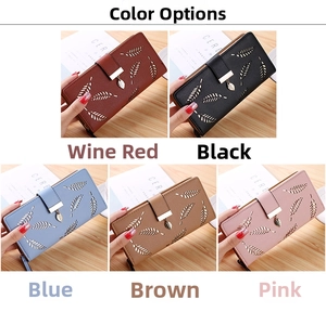 Detailed grid of faux leather wallets featuring hollow leaf patterns and metal zipper pulls