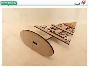 Detail of wooden Christmas tree parts with Santa and Reindeer DIY assembly slots