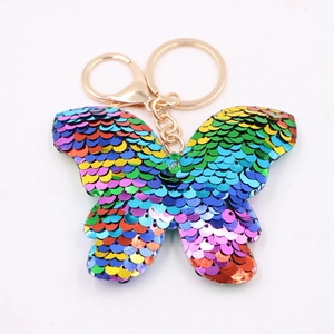 Rainbow butterfly sequin keychain with gold metallic ring and spring clasp on white background