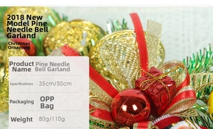 Detail view of 35/50cm pine needle bell string with festive red ribbons and gold bells