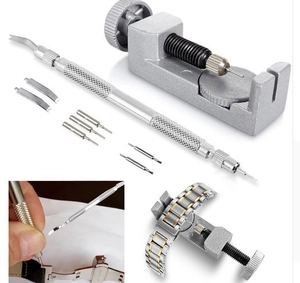 Watch band removal kit featuring metal link adjuster and double-ended spring bar tool