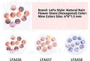 Detail of 6x6mm hexagonal nail art gems with marble texture and central rhinestone inlay