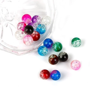 Colorful cracked glass beads for handmade jewelry making displayed on white background