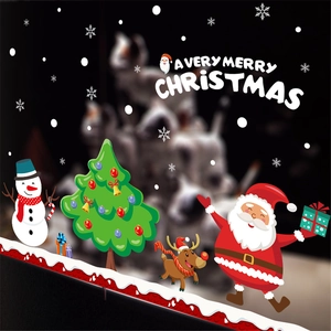 Christmas wall stickers with Santa, snowman and reindeer on a festive window display