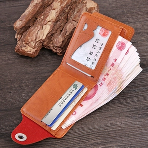 Short vintage brown leather bi-fold wallet with dollar pattern and multi-card slots