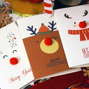 Creative Christmas cards featuring 3D red pom-pom noses with cute reindeer and snowman designs