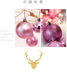 Close-up of pink and purple Christmas ornaments with glitter and matte textures