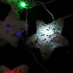 Multi-colored LED star string lights with foam texture and sparkling sequins