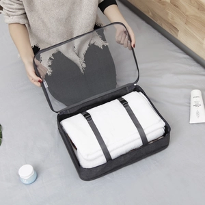 Set de 7 bolsas organizadoras de viaje grises con malla transpirable y correas de cierre