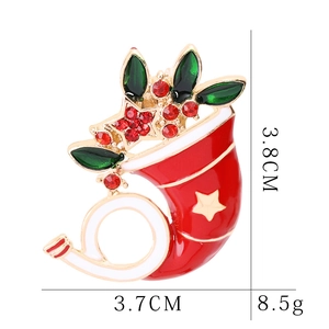 Detailed view showing dimensions of a Christmas stocking brooch with rhinestones