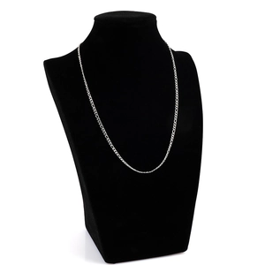 Polished silver Figaro chain necklace displayed on a black portrait bust stand