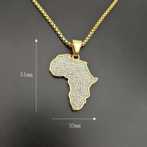 Detailed view of gold plated Africa map pendant with measurements 51mm by 33mm