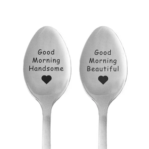 Detail of stainless steel spoons with Good Morning Handsome and Beautiful engraving