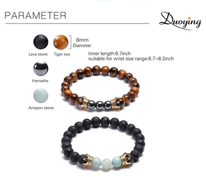 Detail of 8mm lava stone and tiger eye bead bracelet with zircon paved crown