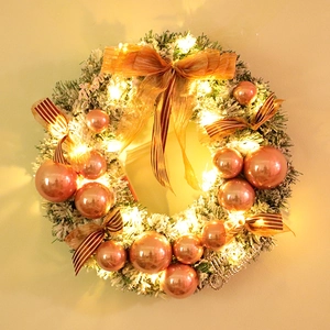 Rose gold flocked Christmas wreath with LED lights and Merry Christmas metal sign