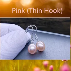 Detailed view of pink freshwater pearl earrings with delicate S925 silver hooks