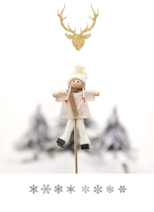Close-up of a Christmas doll ornament with white knit hat and ice skates on metal rod