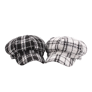 Classic tweed checkered newsboy hats in black and white knit patterns for autumn winter