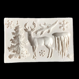 Silicone baking mold with Christmas tree, reindeer and snowflake patterns on black background