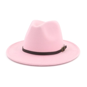 Detail of pink wool fedora hat featuring a brown leather band and antique metal buckle