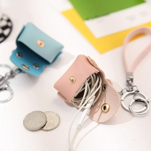 Mini PU leather earphone case with wristlet strap and snap button closure for storage