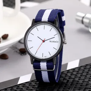 Detail of blue and white striped NATO nylon strap on casual large dial quartz watch