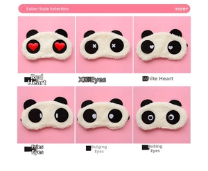 Dettaglio di mascherine per dormire a forma di panda in peluche con ricami vari