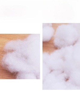 Macro shot showing the soft texture and fluffy fibers of white artificial Christmas snow cotton