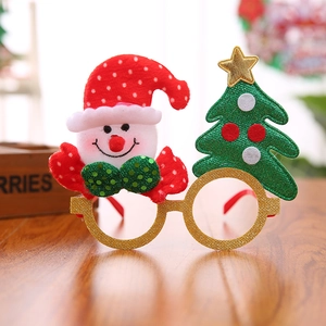 Detailed close-up of festive Christmas glasses featuring snowman and tree decorations