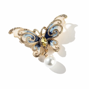 Broche papillon rétro avec ailes en émail bleu, alliage doré et pendentif en perle