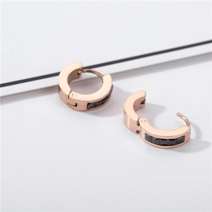 Rose gold titanium earrings with black cubic zirconia squares and hinged closure