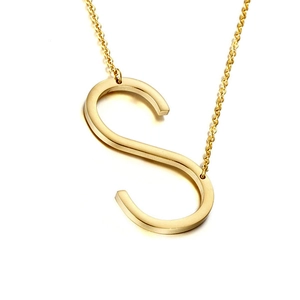 Close-up of polished gold S-letter pendant on fine O-chain stainless steel necklace