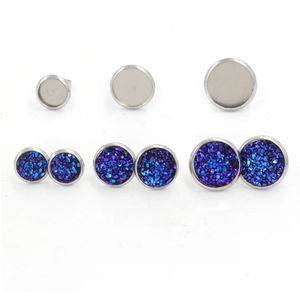 Detail of 8mm 10mm and 12mm stainless steel bezel settings with blue fish scale inlays