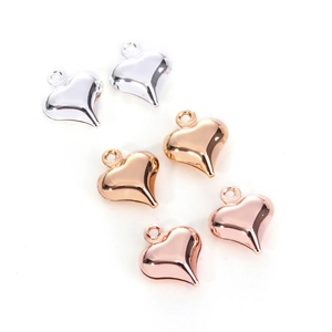Polished hollow heart charms in gold, silver, and rose gold for DIY jewelry making