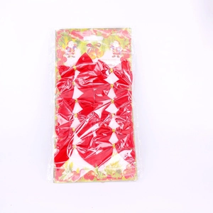 Set of 12 red flocked Christmas bows with gold ties on festive backing card