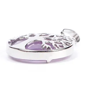 Silver tree of life necklace featuring a round purple amethyst stone pendant on white background