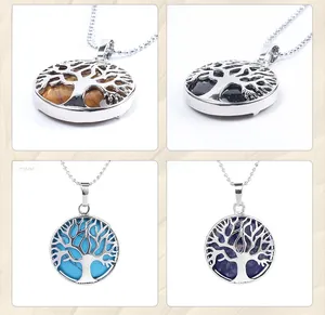 Detail of tree of life pendants in tiger eye, blue sandstone, turquoise and sodalite