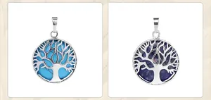 Detail of tree of life pendants with turquoise and lapis lazuli natural stones