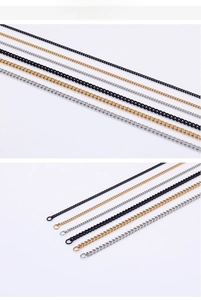 Detail view of stainless steel extender chains in gold, silver and black metal finishes