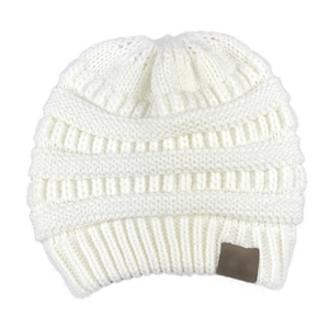 Detailed knit texture and brown leather label on a white ponytail beanie hat