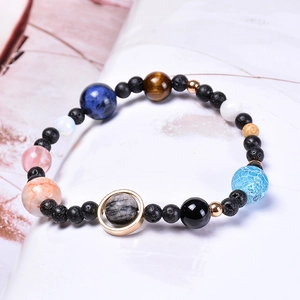 Solar system bracelet with natural stones and lava rock representing eight planets