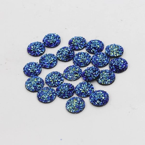 Close-up of 12mm blue round resin starry rhinestones for DIY handmade craft decor