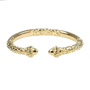 Classic 18K gold open cuff bracelet with textured lattice relief and polished finish