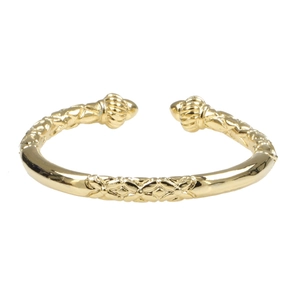 Detail view of the gold-plated woven twist open bangle bracelet with ball ends
