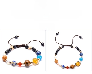 Detail view of solar system galaxy bracelet with natural stones and braided cord