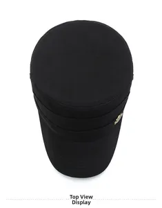 Top view of a black flat top military cap with a golden metal badge detail on twill cotton