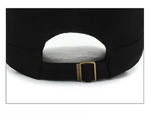 Detail of adjustable metal buckle on black cotton baseball cap for custom fit