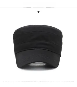 Detail of black cotton cadet cap with metallic HEYHAT badge and reinforced stitching